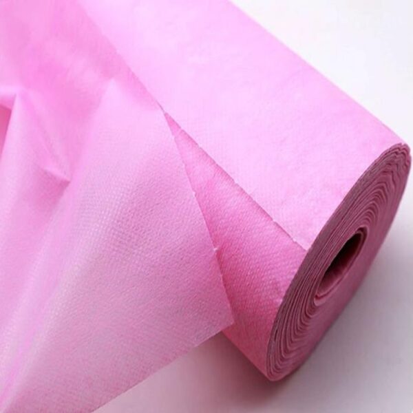 Bänkpapper Rosa Nonwoven PP 60cm x 195m Perforerad